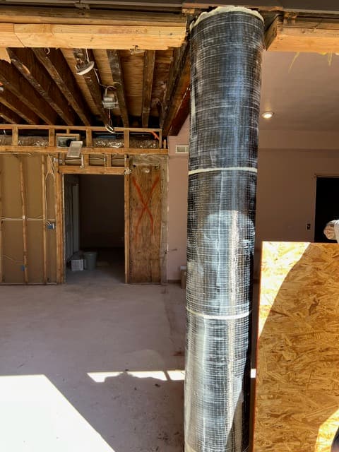 Beam-to-column joint of a concrete moment frame strengthened with externally bonded FRP fabric