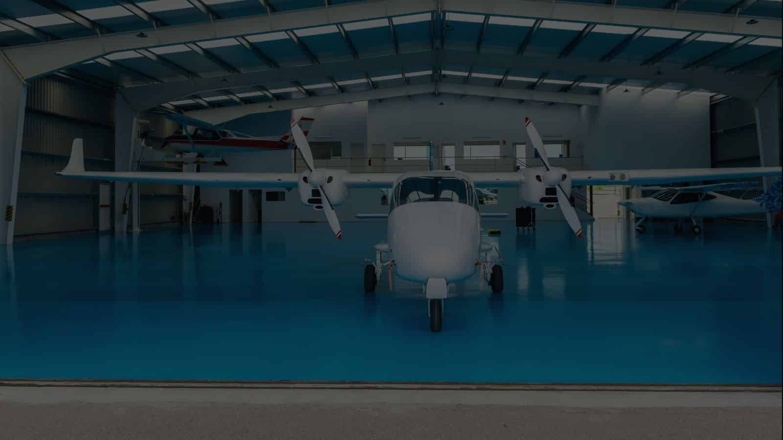 High-gloss epoxy floor in an automotive service and dealership space